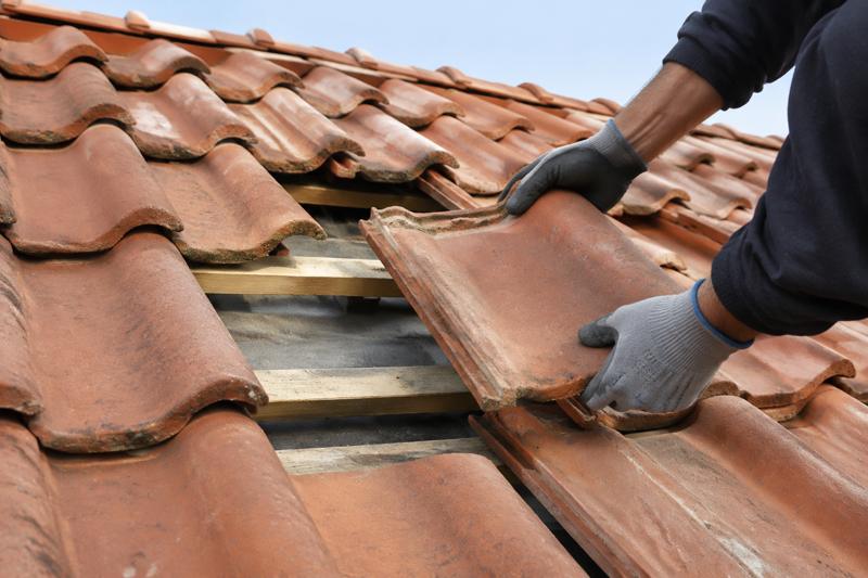 Remplacement tuiles abîmées